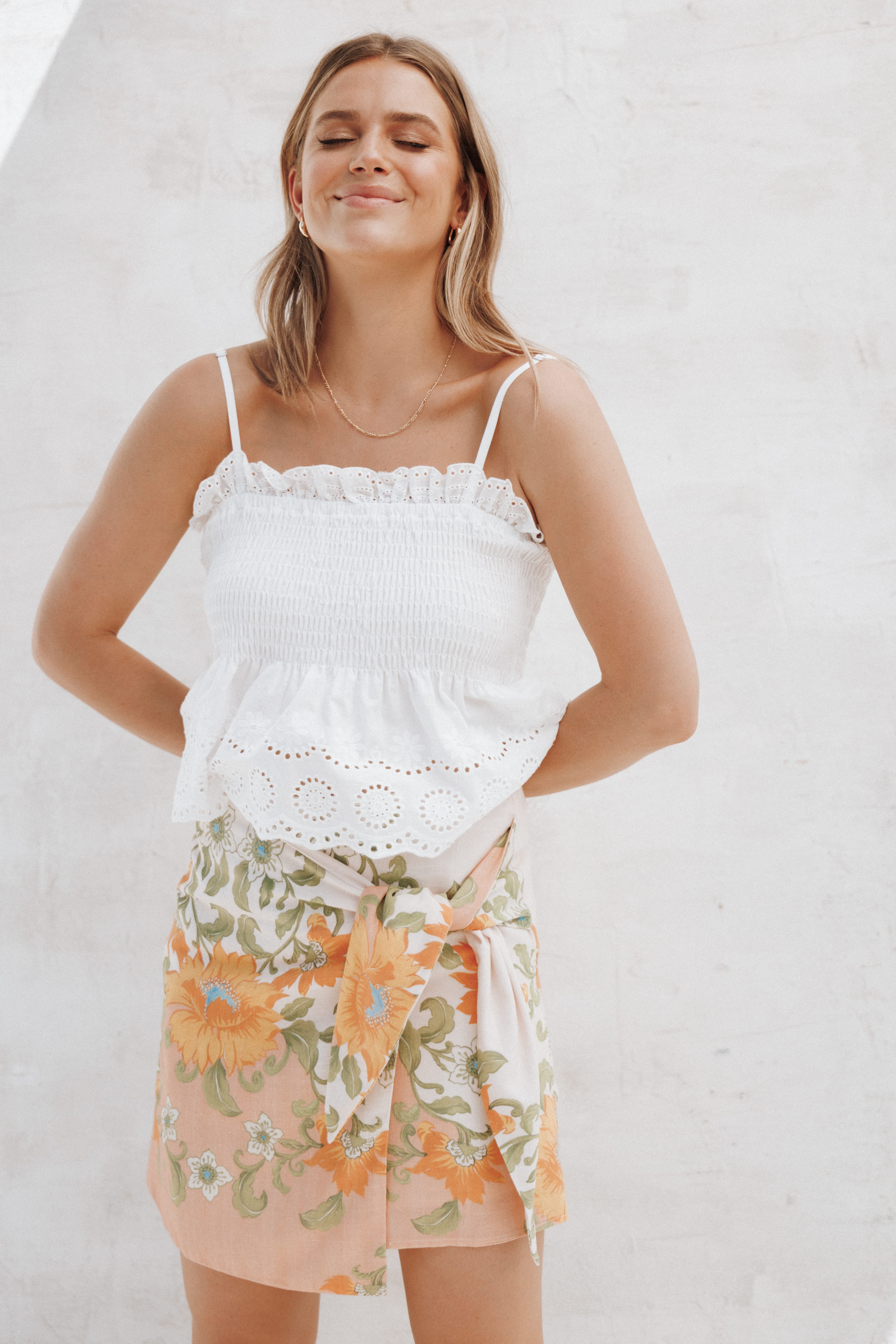 Calypso Wrap Mini Skirt - Yellow Spring Floral